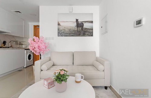 Dubai Production City Apartment | WelHome - Lovely Studio Apartment in Production City