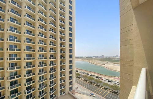 Dubai Production City Apartment | WelHome - Lovely Studio Apartment in Production City
