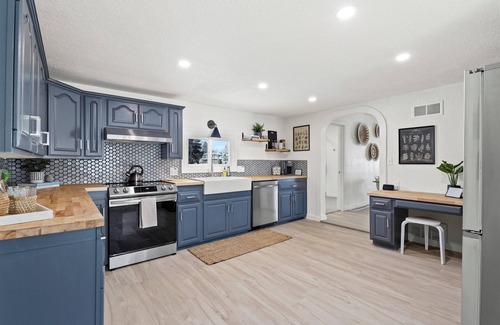 Village of Pewaukee House | Well Appointed Home Steps from Pewaukee Lake & Large Patio