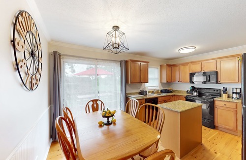 Mills River House | Well-located home in town with sunrise views, deck & great backyard