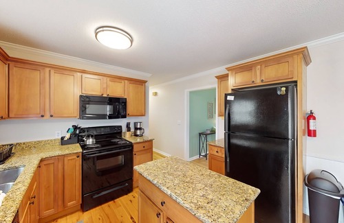 Mills River House | Well-located home in town with sunrise views, deck & great backyard