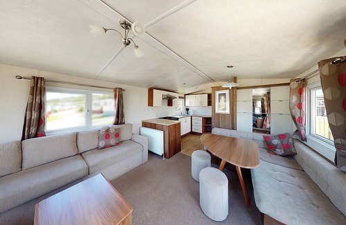 Narberth House | Well presented 12ft-wide caravan with one double and one twin.