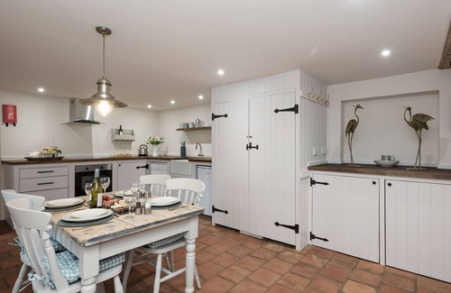 Irstead Cottage | What better than enjoying a day at the beach, or just curingl up in front of the cosy wood burner.