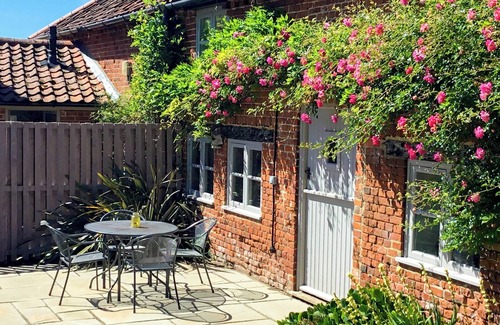 Irstead Cottage | What better than enjoying a day at the beach, or just curingl up in front of the cosy wood burner.