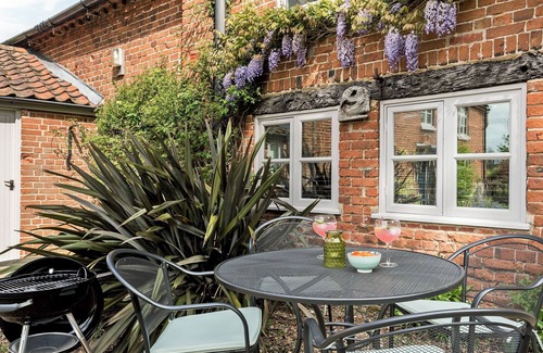 Irstead Cottage | What better than enjoying a day at the beach, or just curingl up in front of the cosy wood burner.