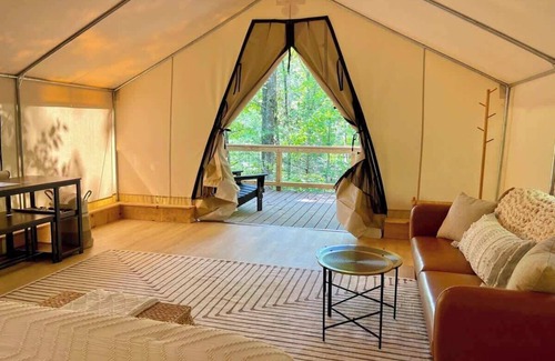 Zoe RV Rental | Whippoorwill's Nest - Glamping Tent with AC