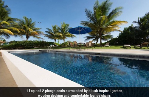 Maxwell Condo | White Sand Beach Front, Turquois Blue Ocean View, Pools, Hot tub, Guarded,5 star