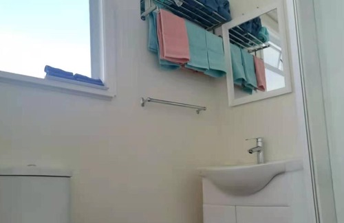 Henderson House | White weather board house - 3 bedrooms full house