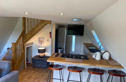 Tattershall House | Widgeon Bespoke Cabin is lakeside with Private fishing peg, hot tub situated at Tattershall Lakes Country Park