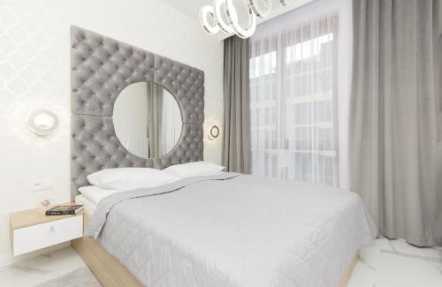 Wilanow Apartment | Wilanów Holzera Elegant Apartment with Sauna, Gym & Parking by Noclegi Renters