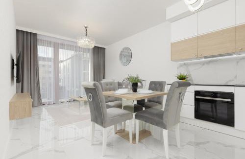 Wilanow Apartment | Wilanów Holzera Elegant Apartment with Sauna, Gym & Parking by Noclegi Renters