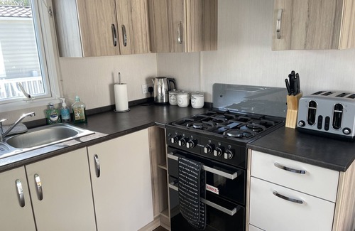 Hamworthy House | Wild Rose Gorgeous Caravan on Rockley Park with Sea View close to entertainment