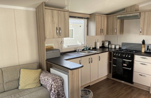 Hamworthy House | Wild Rose Gorgeous Caravan on Rockley Park with Sea View close to entertainment