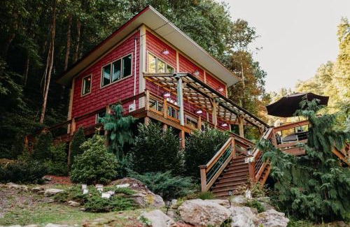 Hot Springs House | Windows Over Waterfalls