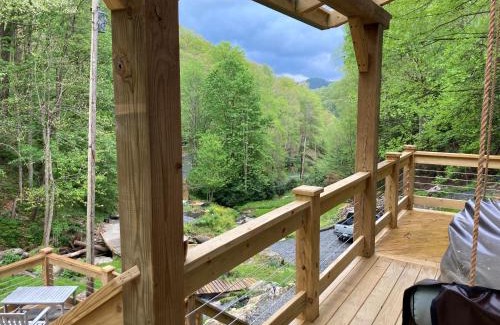Hot Springs House | Windows Over Waterfalls