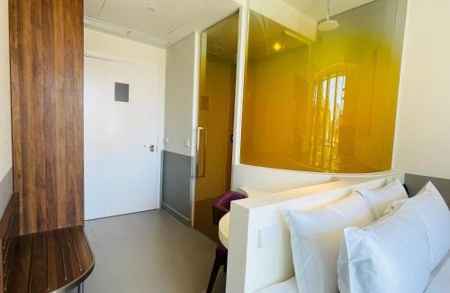 Son Tra Hotel | Wink Icon Hotel Danang Riverside - Luxury Suites - 24hrs Stay & Rooftop Pool Bar