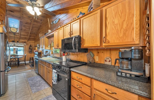 Moultonborough House | Winnipesaukee Lake Front Cottage with Sandy Beach and 25ft Dock Sleeps 8