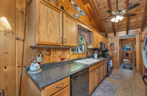 Moultonborough House | Winnipesaukee Lake Front Cottage with Sandy Beach and 25ft Dock Sleeps 8