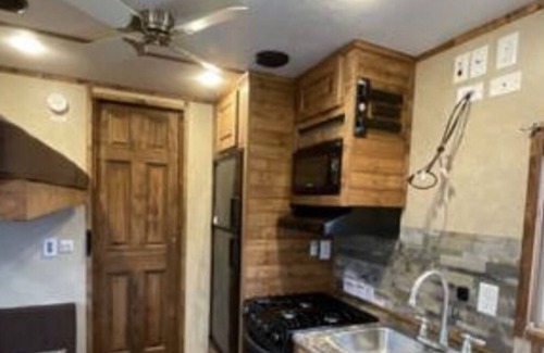 Balsam Lake RV Rental | Winter Glamping in a heated 21’ Ice Castle