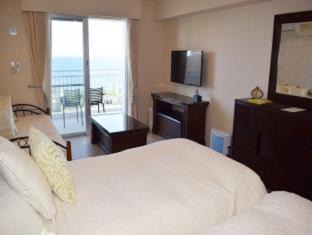 Motobu Hotel | Wisteria Condominium Resort