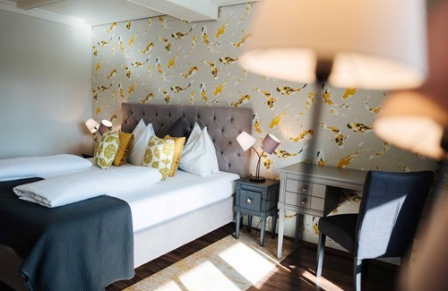 Feld am See House | Wohnzimmer Fisch & Chips HP ab 5 Nächten - Bike-boutiquehotel Lindenhof