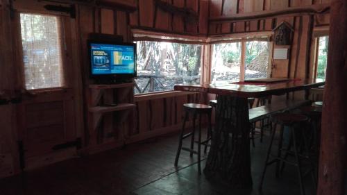 Pucon House | Wonderful rustic cabin, with native trees, with Rio Trancura, equipped