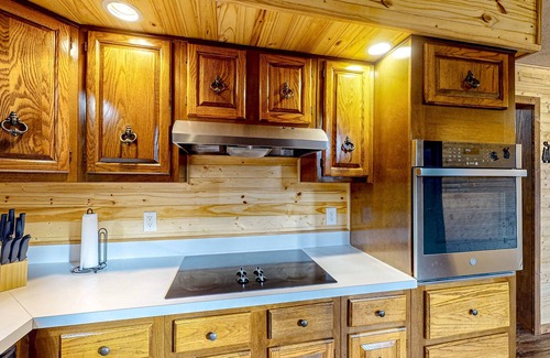Gnaw Bone House | Wooded acreage with wrap-around deck, hot tub, central AC, & game room