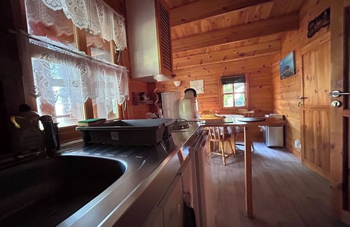 Les Mathes Ski Chalet | Wooden chalet in a wooded setting