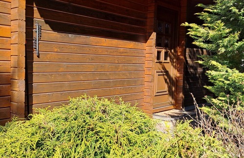 Caputh House | Wooden house in a park-like garden