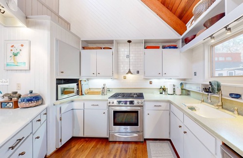 Durham House | Woodland acreage with 60' deck on gurgling brook, pizza oven, rec area & library