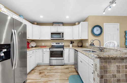 Miramar Beach House | Woodland Shores 37: Steps to Beach, 2 Pools + Free Attraction Tickets!