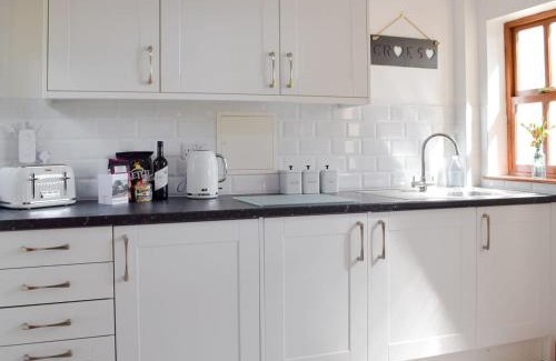 Cardigan House | Woodpecker Rest