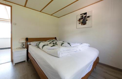 Oisterwijk Ski Chalet | Woudcottage met airco!