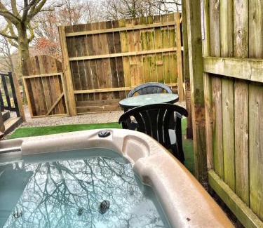 Llanybri Ski Chalet | Wren 23-Hot Tub-Woodland Lodges-Tenby-Pembroke