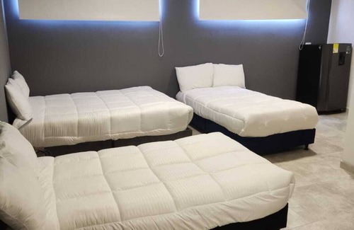 Barrios Unidos Hotel | XLiving Host & Rooms