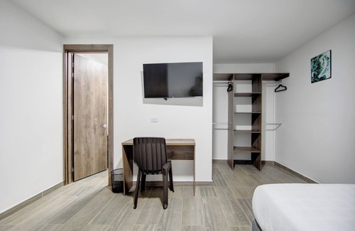 Barrios Unidos Hotel | XLiving Host & Rooms