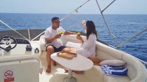 Santa Cruz de Tenerife Boat Rental | Yacht Experience Tenerife 24h plus Tour with private Skipper & private Hostess all inclusive with Cocktails, Sandwiches and free Minibar