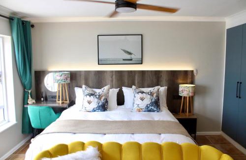 Strand Apartment | Yellow Couch Studio Apartment 1 KingBed