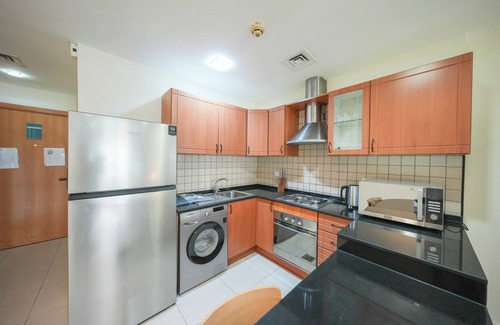 Dubai Apartment | Yogi - Cozy Retreat In This Stylish Studio With Balcony