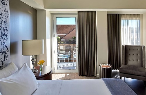 West Plaza Hotel | Your Home Away From Home! Balcony, Pet-friendly Property, Onsite Swimming Pool