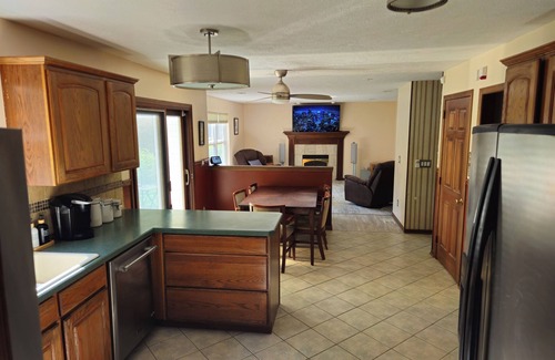 Seven Hills House | Your home retreat nestled in a small quiet tree-lined neighborhood.