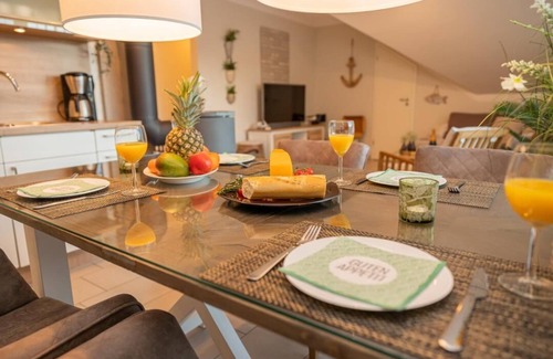 Zingst Apartment | Zum Kranich, exclusive 4-star-plus vacation apartment with fireplace for 4 people in Zingst