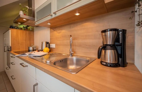 Zingst Apartment | Zum Kranich, exclusive 4-star-plus vacation apartment with fireplace for 4 people in Zingst