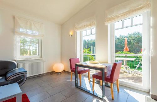 Muritz Apartment | Zwergtaucher - Ferienwohnung mit Balkon, Seeblick & Freizeitangeboten am See