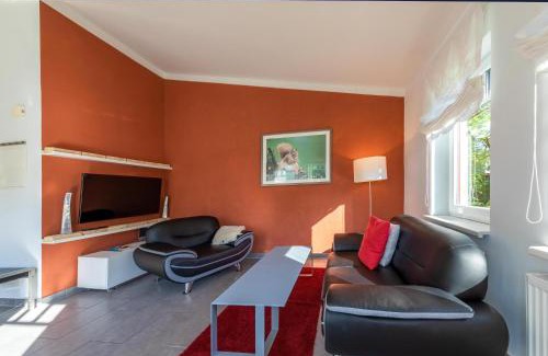 Muritz Apartment | Zwergtaucher - Ferienwohnung mit Balkon, Seeblick & Freizeitangeboten am See