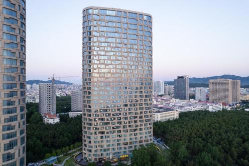 沃德酒店威海国际海水浴场火炬八街店