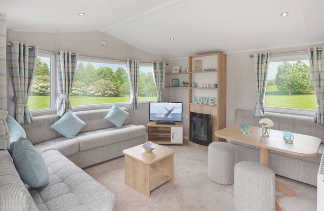12ft-wide stylish and comfortable caravan with one double and one twin.
