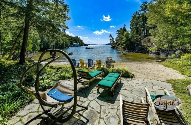 1300' of Ultra Private Frontage! 3bed 2bath! Waterfall! Tennis Court!