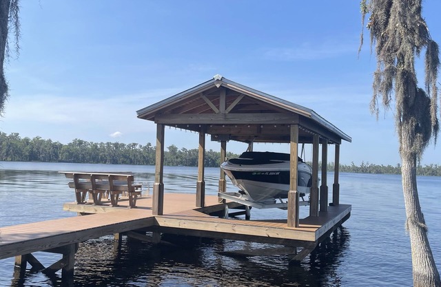 2 bed 2 bath on Clermont chain of lakes with dock & boat lift Emerald Lakes 55+