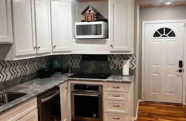 2 Bedroom Luxury Home. Wooden Floors and Ceilings